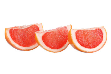 three juicy, fresh grapefruit slices on a white isolated background