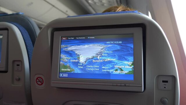 LCD monitor showing a map in the airplane in 4K slow motion 60fps
