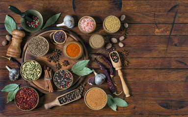 Spices and seasonings on wooden table