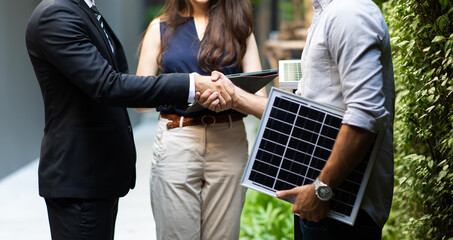 Electrical Engineer Technician and CEO executive business people making handshake after meeting. clean and green alternative energy concept. © NVB Stocker