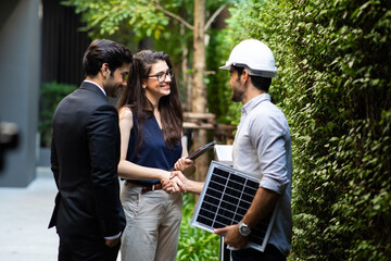 Electrical Engineer Technician and CEO executive business people making handshake after meeting. clean and green alternative energy concept.
