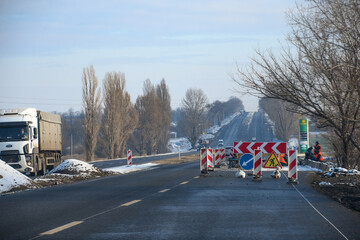 Road works, horizontal. Gas station on the right side. High quality photo