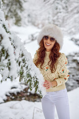 Attractive young woman in wintertime outdoor