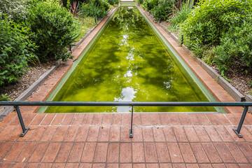 Paris Le Viaduc des Arts on Avenue Daumesnil - former railway line viaduct today housing art galleries, shops, restaurants. Beautiful Promenade Plantee Public Park on its top. Paris, France.