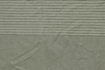 Green fabric texture for clothing.