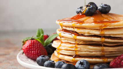 Stack of pancakes with berries