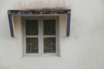 Fototapeta na wymiar rustic window on white wall