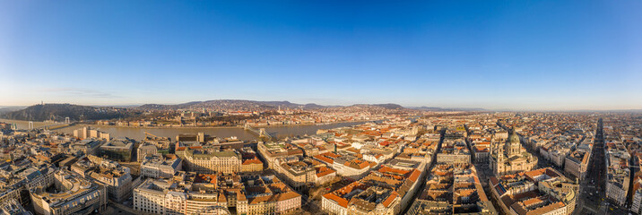 Panorama aerial drone shot of Pest downtown in Budapest sunrise glow