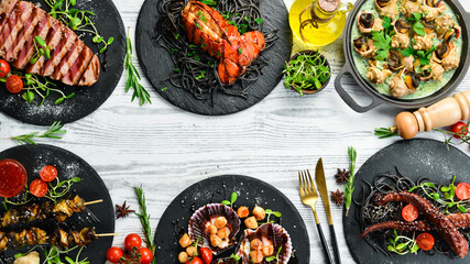 Set of seafood dishes on a white wooden background. Restaurant food. Seafood. Rustic style. Flat Lay.