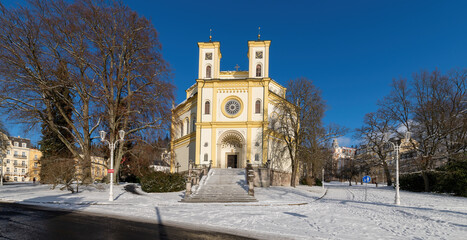 Roman Catholic Church of the Virgin Mary Assumption in winter with snow - small spa town Marianske Lazne (Marienbad) - Czech Republic (region Karlovy Vary)