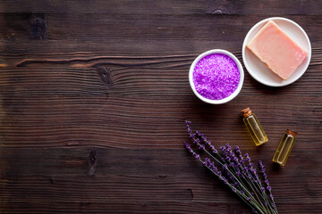 Fototapeta na wymiar Skin care beauty treatment - lavender bath salt and essential oil, top view