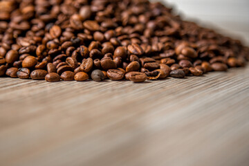 Arabica coffee beans lie on the table