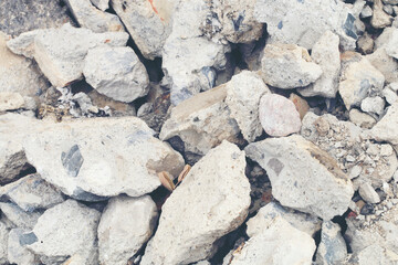 broken concrete floor at building construction site. cracked concrete texture background. Grey...