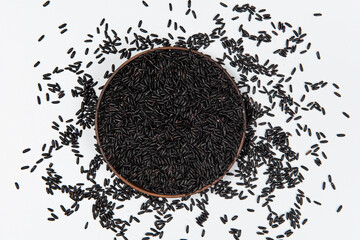 bowl of black rice on white background