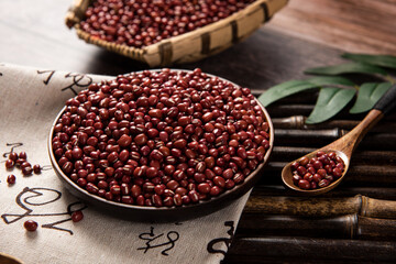 azuki beans , red beans on wooden background