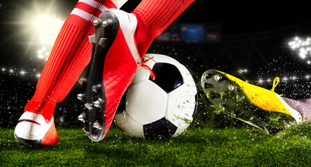 Two football player man in action on dark arena background