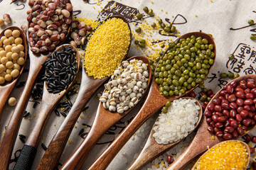 Collection of different cereals, grains and beans backgrounds.