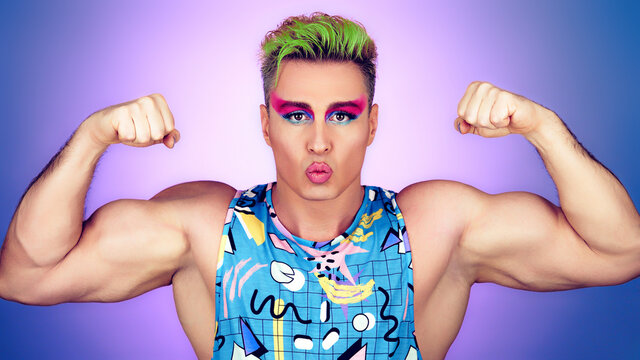 Beauty Fashion Muscular Guy With Colorful Art Makeup, Green Hair. Sexy Fitness Man With Make Up. Handsome Bodybuilder, Healthy Male Athletic Body, Lgbtq Concept. Happy Positive Motivation