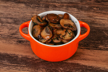 Roasted champignon with herbs and spices