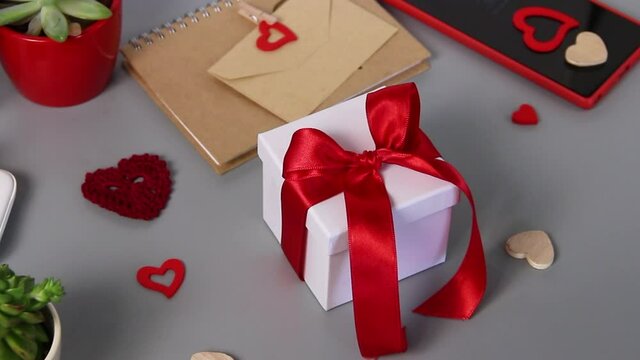 Valentine's day Present with a red ribbon bow zoom in