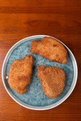 breaded meat with fried potatoes and edamame as kids food
