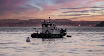 fishing boat at sunset