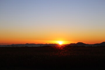 Fototapeta premium sunset over the river
