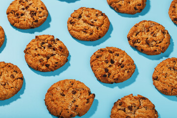 Oatmeal cookies on a blue background with a pattern in the form of a pattern.
