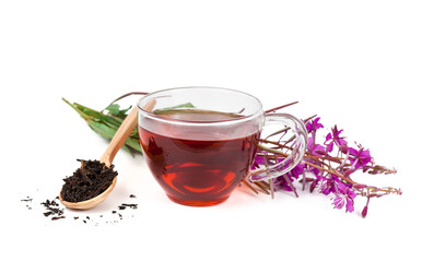 Cup of herbal tea, heap of dry tea in a wooden spoon and blooming Chamerion angustifolium (common names: fireweed, great willowherb, rosebay willowherb) isolated on a white background.