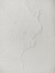 Vertical white clean background with the texture of plaster