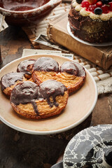 Ingredients for a healthy breakfast, nuts, oatmeal, honey, berries, fruits, blueberry, orange, pomegranate seeds, almonds, walnuts. The concept of natural organic food in season. Bread