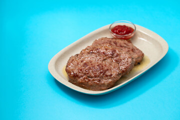 fried ground meat with tomato sauce on dish