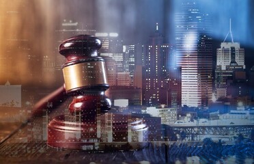 Real judges gavel, city view