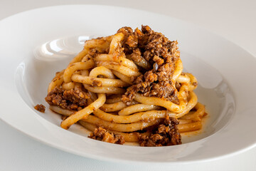 Plate of pici with wild boar ragout