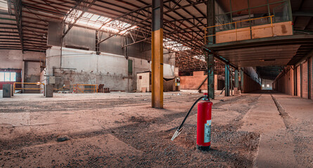 A decayed factory hall an abandoned industry area with natural decay