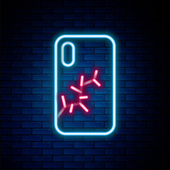 Glowing neon line Smartphone with broken screen icon isolated on brick wall background. Shattered phone screen icon. Colorful outline concept. Vector.