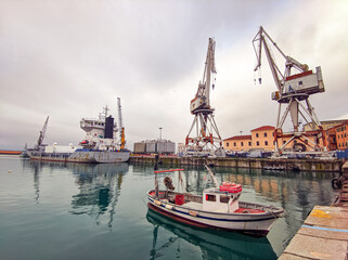 commercial port of imperia with ancient port cranes