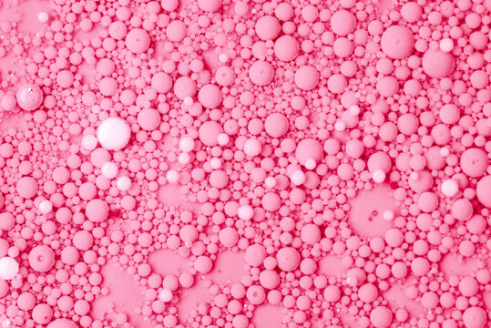 Abstract background of various pink bubbles, macro composition