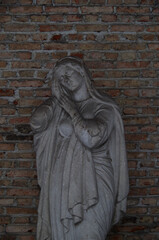 Tombstones and graves, family crypts and vaults on graveyard or cemetery with angels, saints and...
