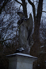 Tombstones and graves, family crypts and vaults on graveyard or cemetery with angels, saints and...