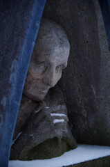 Tombstones and graves, family crypts and vaults on graveyard or cemetery with angels, saints and...