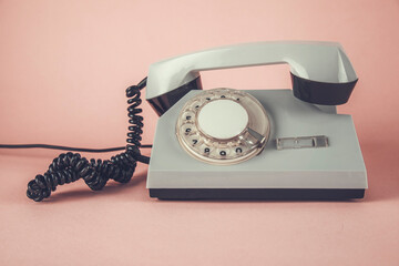 vintage phone on pink table