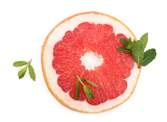 Juicy grapefruit pieces with fresh mint on the white background