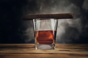 glass of whiskey and cigar