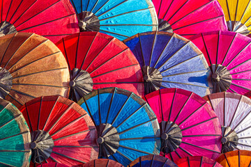 Colorful umbrellas on a market in Laos