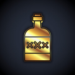 Gold Tequila bottle icon isolated on black background. Mexican alcohol drink. Vector.