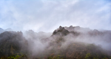 Foggy mountains and rocks in autumn