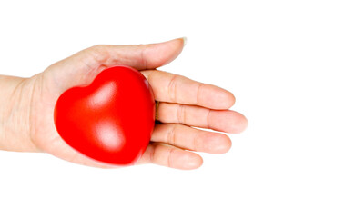 Fototapeta premium heart on hand for philanthropy concept The old woman's hand holding a red heart in hands for valentines day or donate help give love warmth take care , World Health Day 