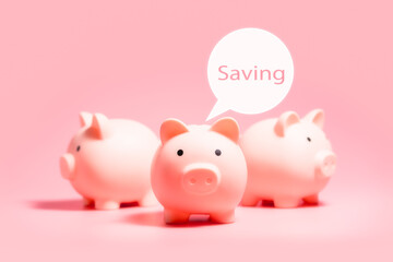 Piggy banks with white blank bubble text on isolated pink background with copy space. Money Saving Concepts