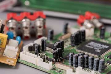 Old circuit board of electronic device illustrating concept of planned obsolescence